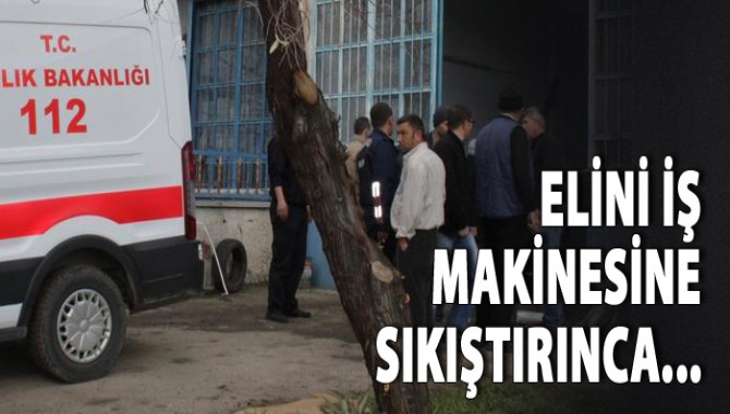 Eli iş makinesine sıkıştı..