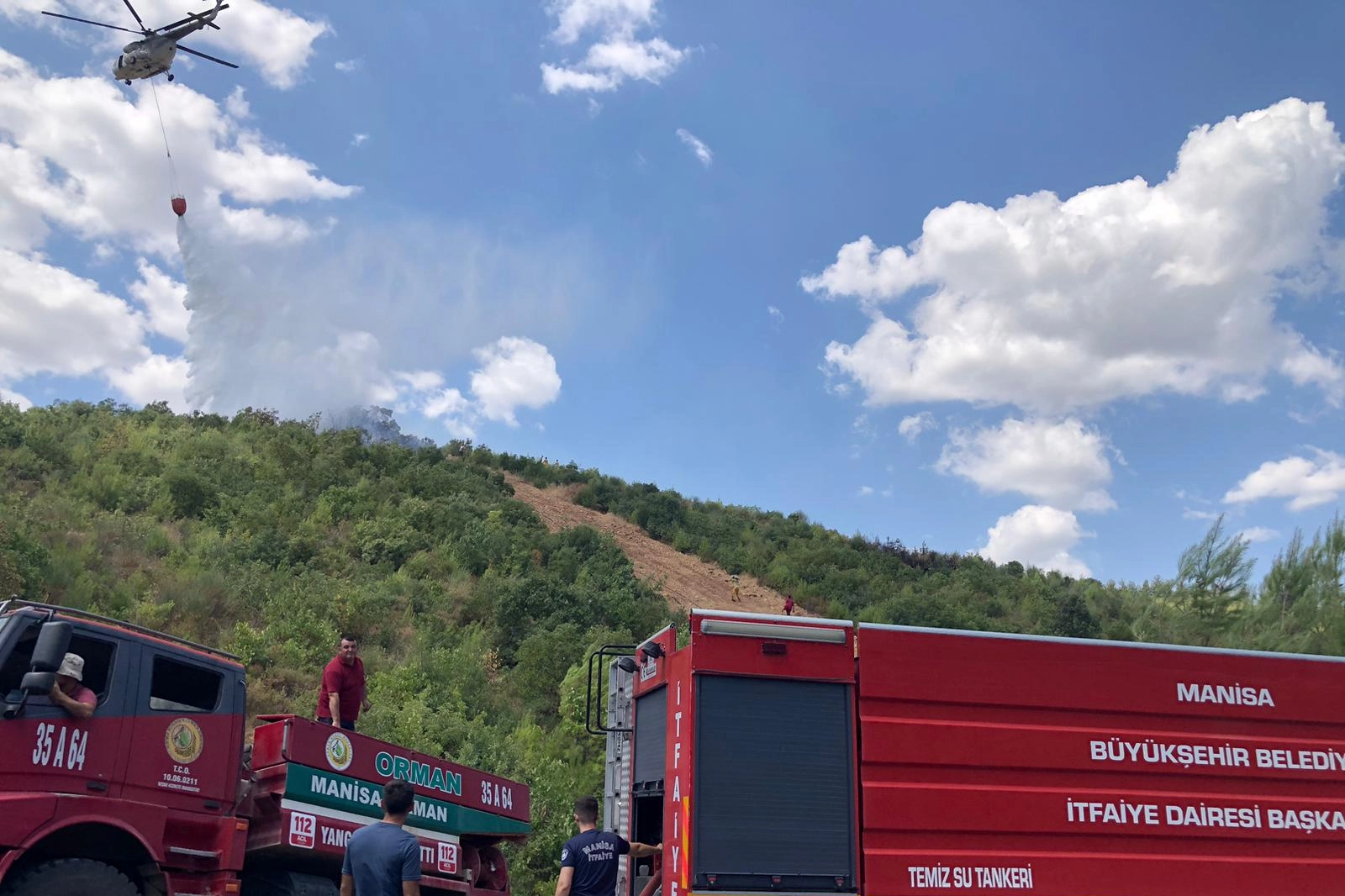 Manisa'da ormanlık alanda çıkan yangın söndürüldü  -